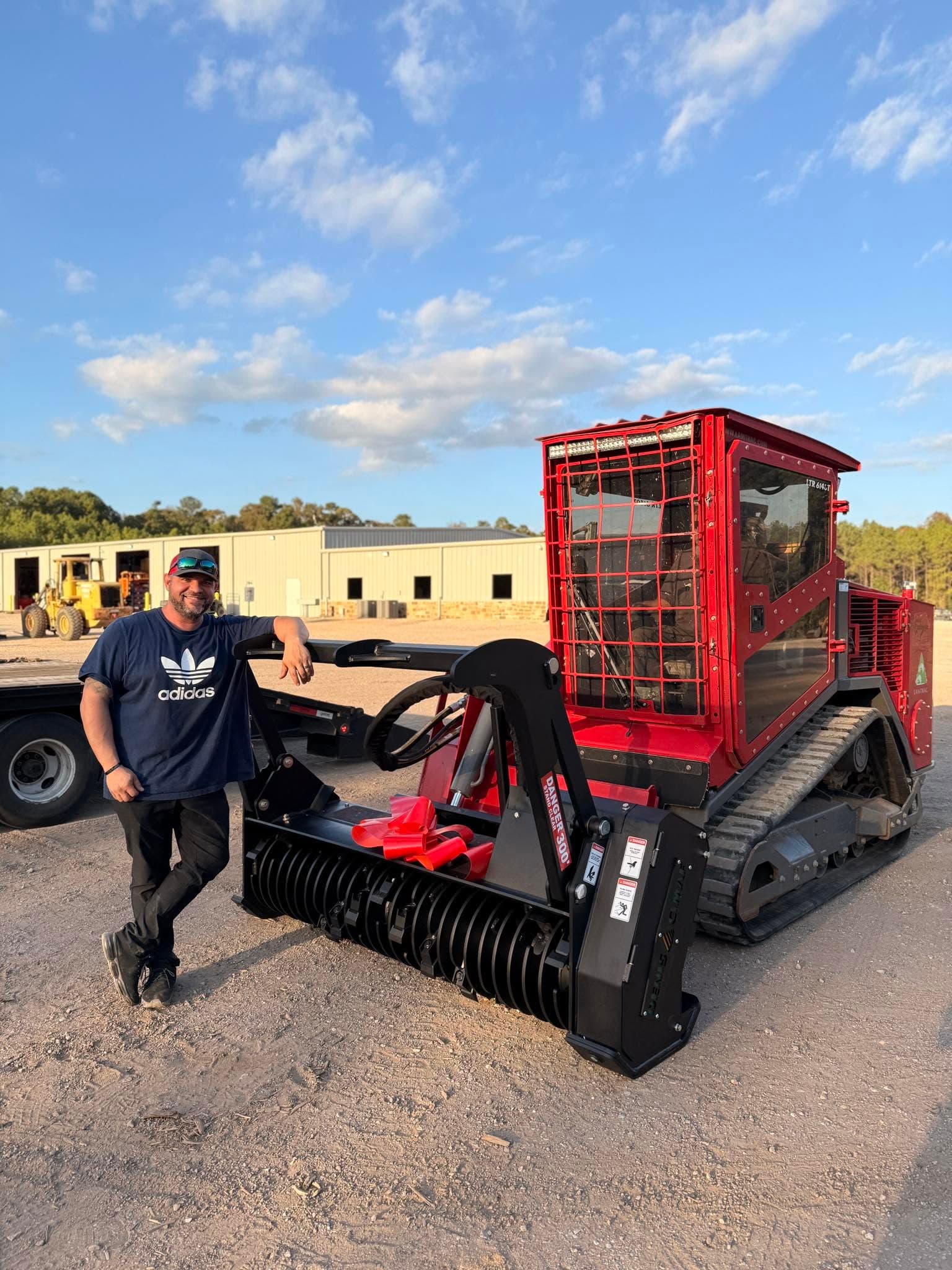 Jason with the forestry mulcher on a Patriot Property Services job site